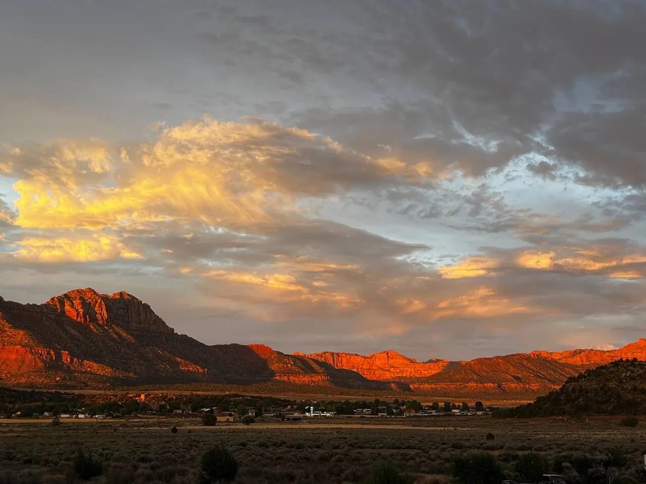 Sunset over the red cliffs near Anasazi Cliffs Lodging